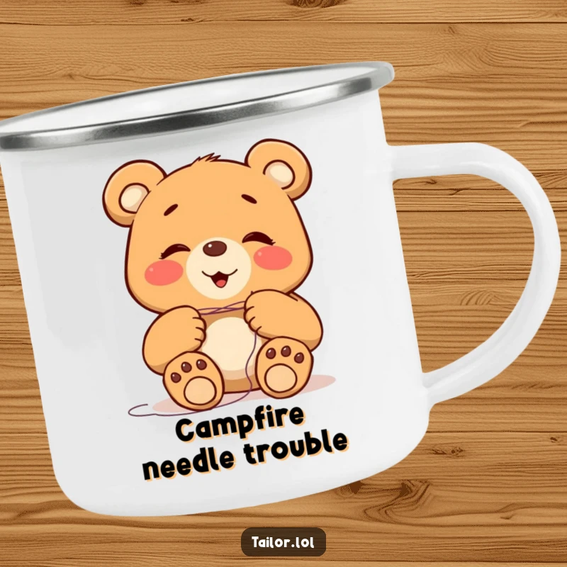 Funny giggling bear character with big paws attempting to thread a tiny needle, on a durable camping mug, ideal for outdoor use.