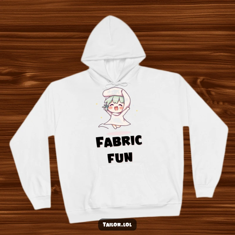 Funny hoodie featuring a happy character gleefully bouncing a roll of fabric, perfect for cozy crafting and humorous relaxation.