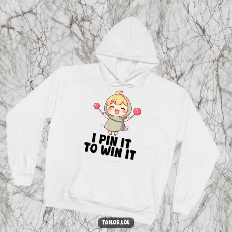 Funny hoodie featuring a joyful character pinning fabric with a comically oversized pin, a perfect humorous gift for quilters.