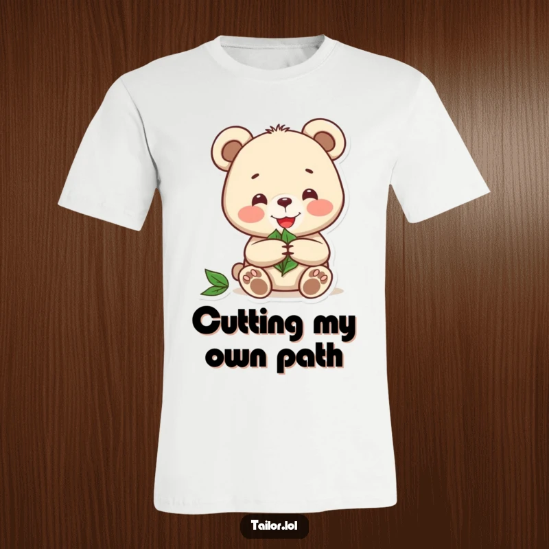 Funny t-shirt featuring a joyful bear carefully cutting a pattern from a leaf, embodying nature-inspired creativity.